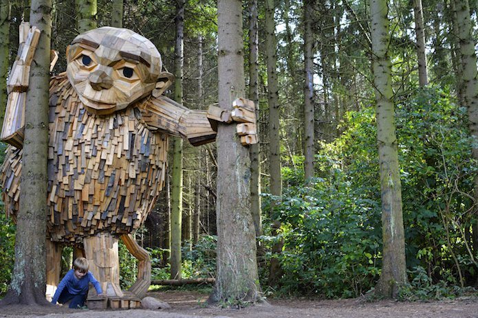 He hides wooden giants in the forests all around Copenhagen